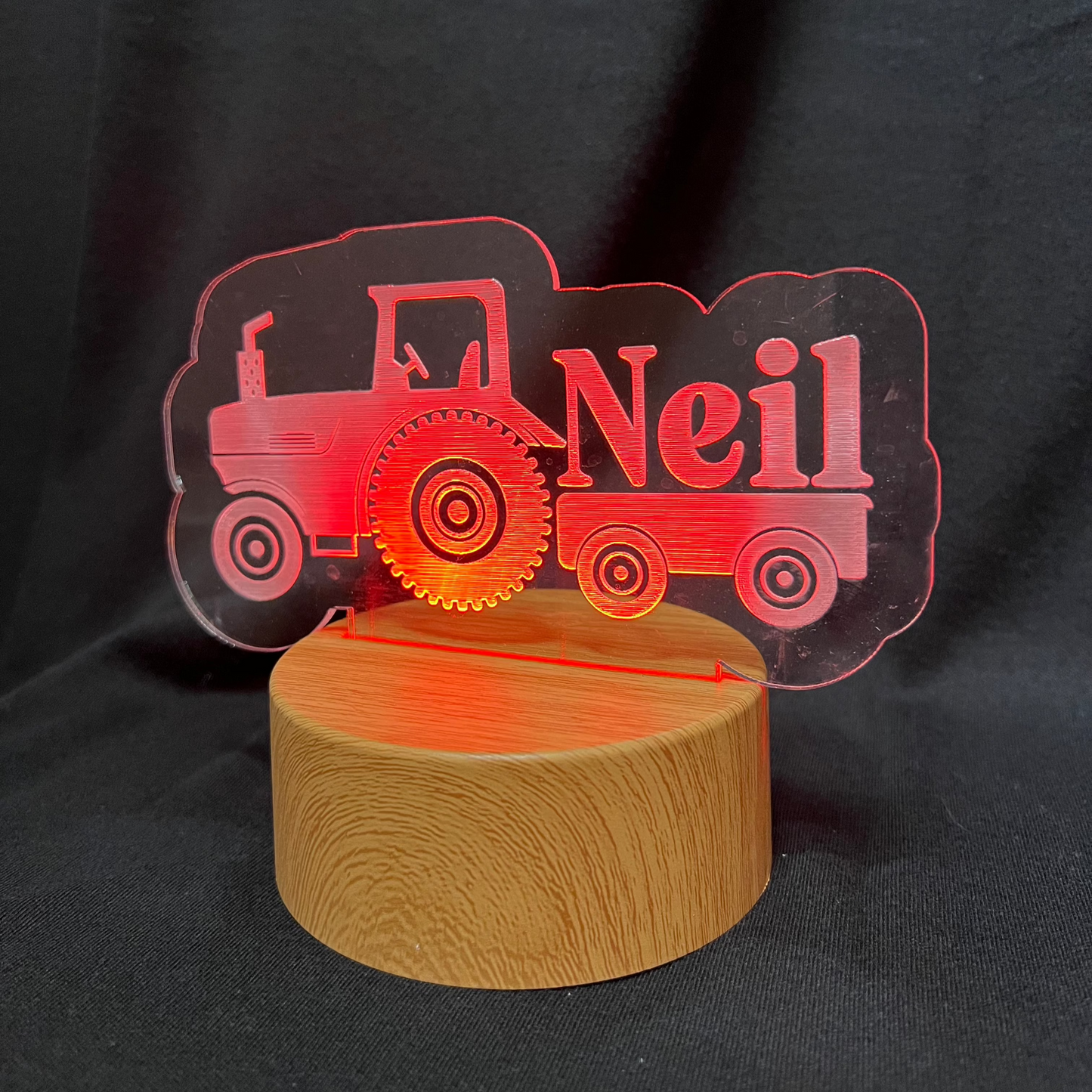 Custom LED night light featuring a tractor design and engraved name