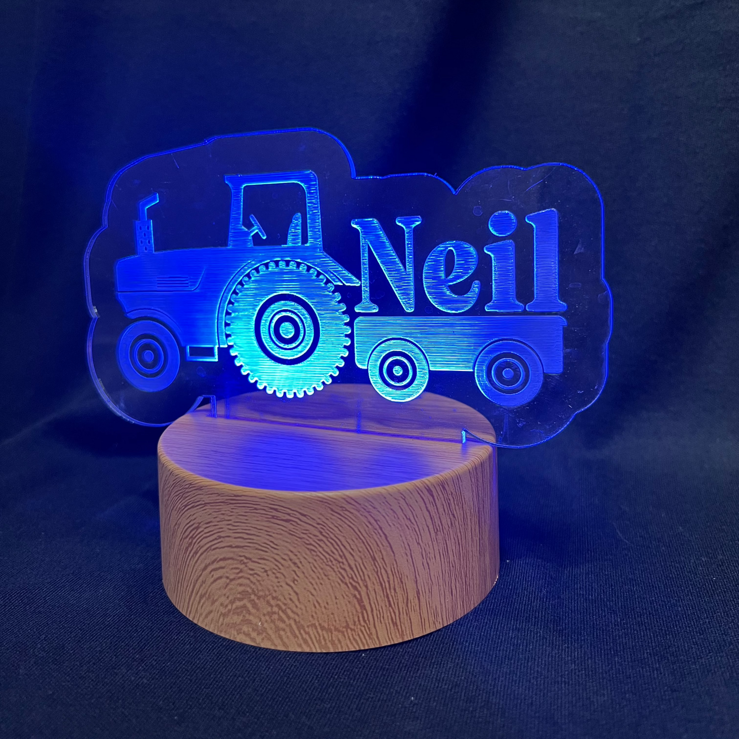 Custom LED night light featuring a tractor design and engraved name
