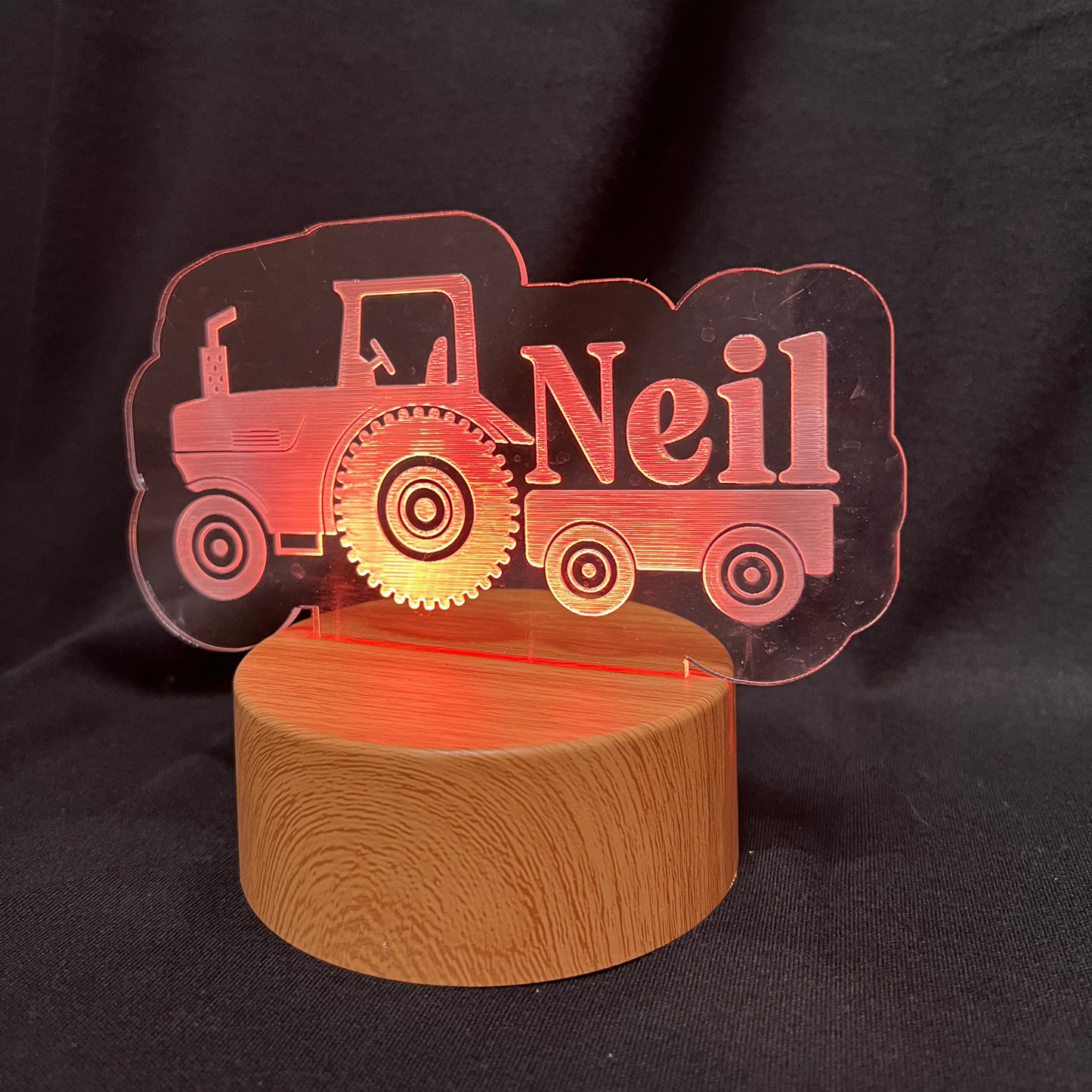 Custom LED night light featuring a tractor design and engraved name