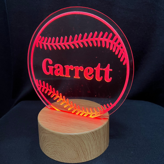 Baseball Softball Name Night Light – Personalized LED night light featuring an engraved baseball or softball design with a custom name in the center, glowing warmly for sports fans