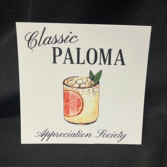 Sticker with the text 'Classic Paloma Appreciation Society' featuring an illustration of a tall glass filled with a pink grapefruit paloma, ice cubes, a salted rim, and a grapefruit wedge garnish.