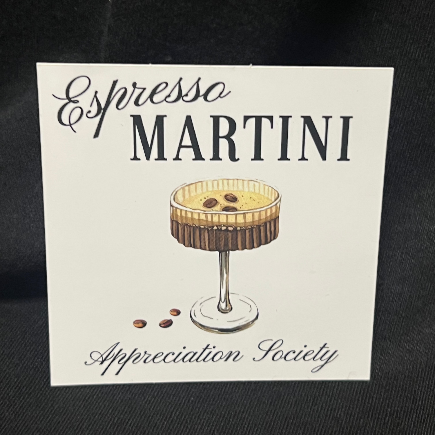 Sticker with the text 'Espresso Martini Appreciation Society' featuring an illustration of an espresso martini in a coupe glass with a coffee bean garnish