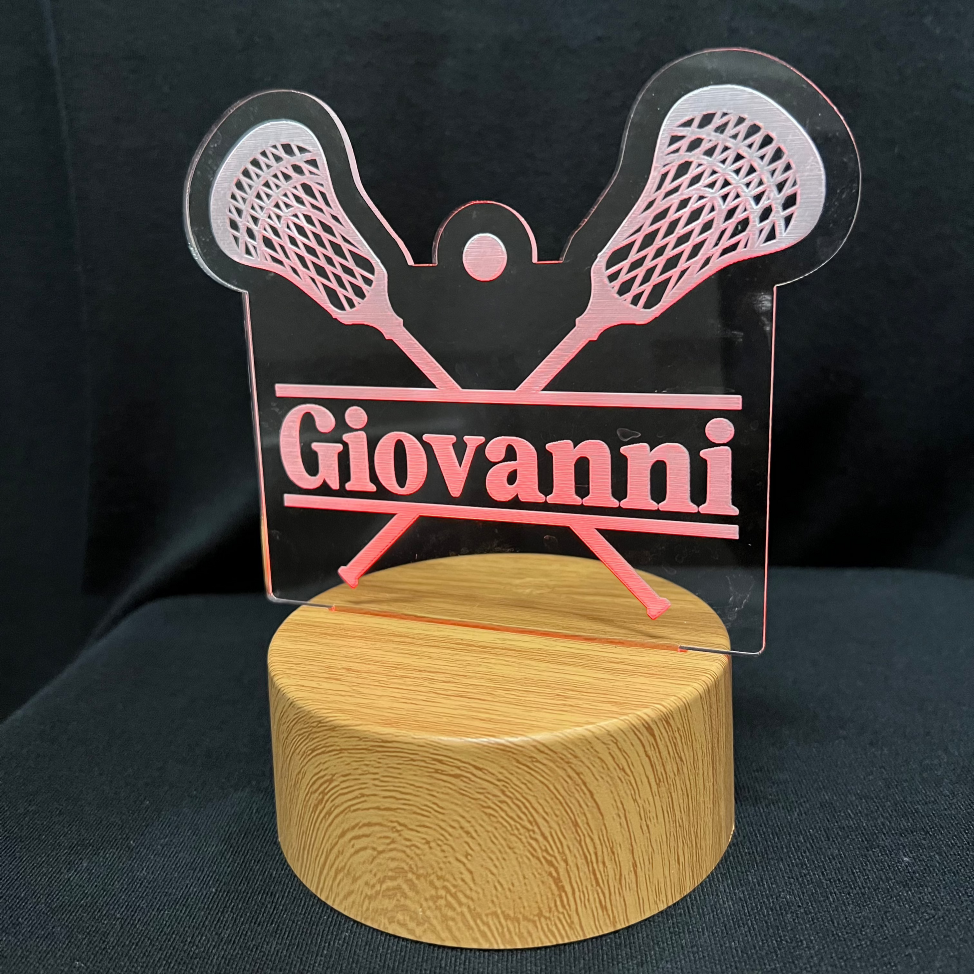 Lacrosse Name Night Light – Personalized LED night light featuring an engraved lacrosse stick and ball design with a custom name in the center, softly glowing for lacrosse players and fans.