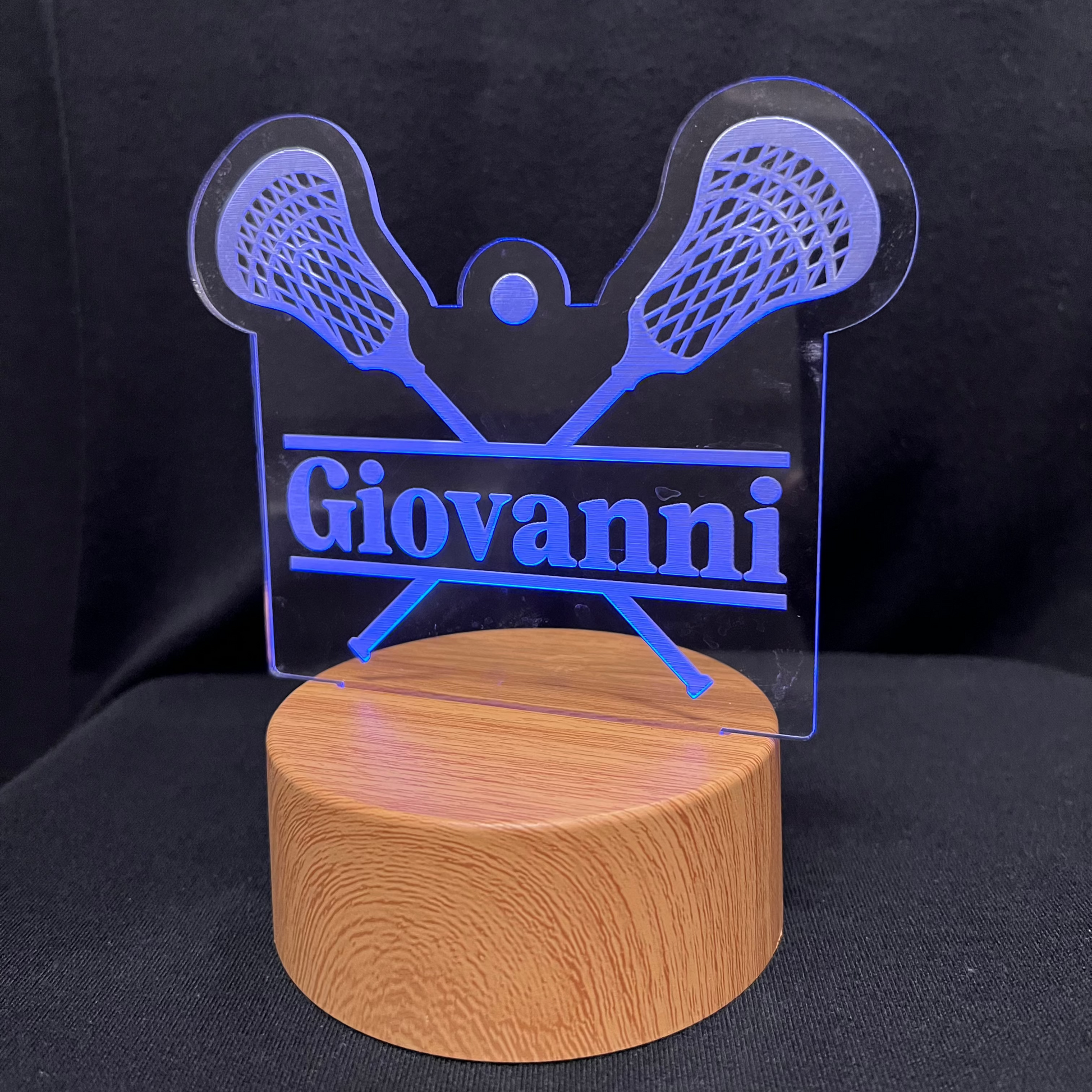 Lacrosse Name Night Light – Personalized LED night light featuring an engraved lacrosse stick and ball design with a custom name in the center, softly glowing for lacrosse players and fans.