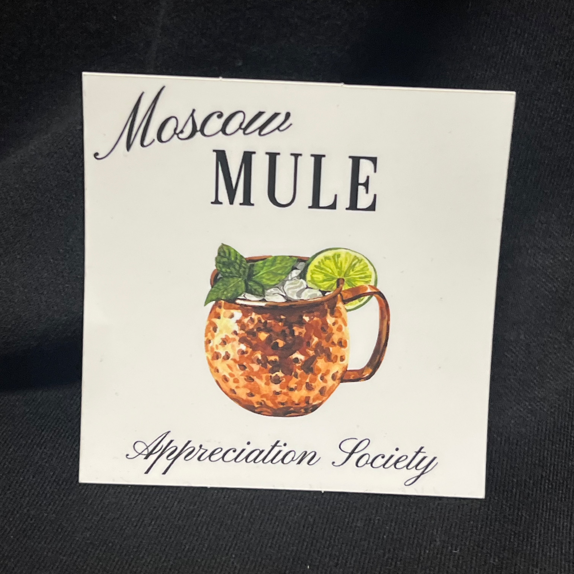 Sticker that says Moscow Mule Appreciation Society with an illustration of a classic copper mug filled with a Moscow Mule, perfect for cocktail lovers and ginger beer fans
