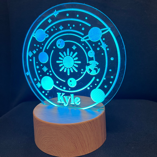 Solar System Name Night Light – Personalized LED night light featuring engraved planets with a custom name, glowing softly for space lovers