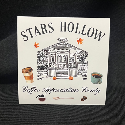Sticker that reads ‘Stars Hollow Coffee Appreciation Society’ with an illustration of the iconic Stars Hollow gazebo in the center, celebrating small-town charm and caffeine love