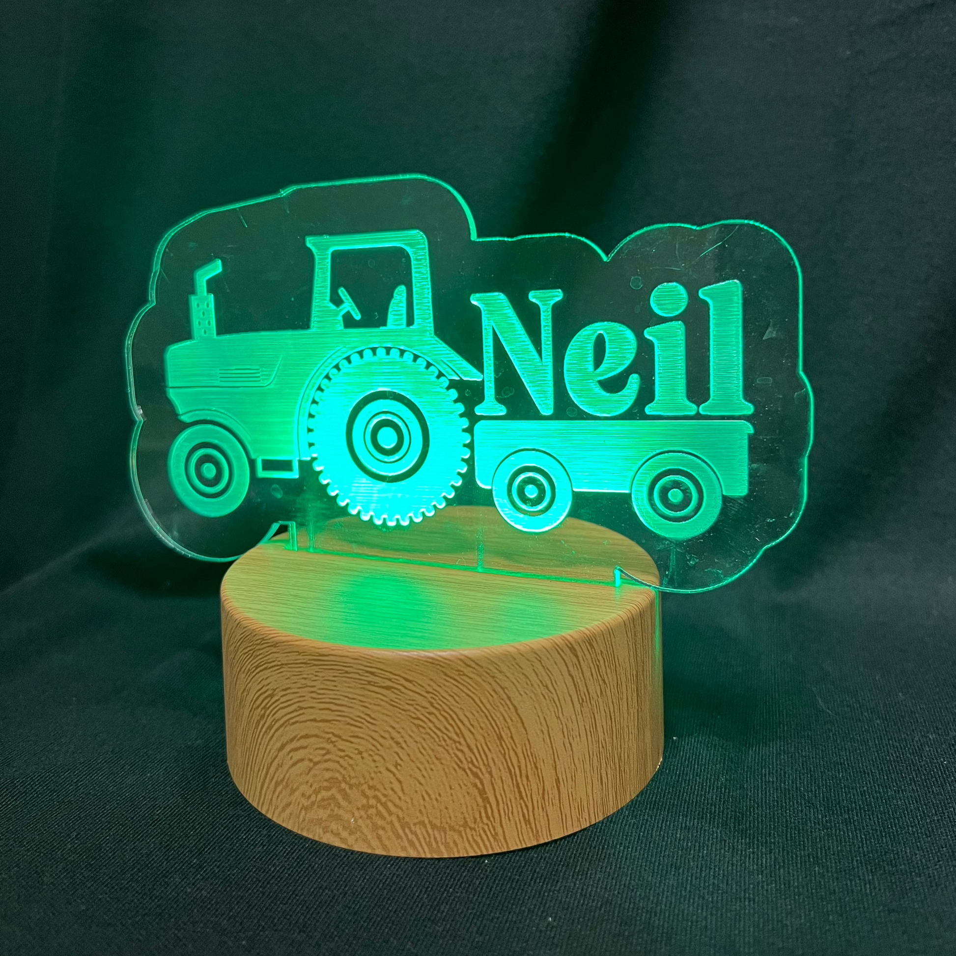 Custom LED night light featuring a tractor design and engraved name