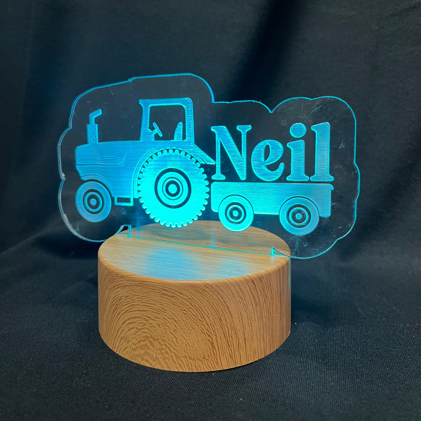 Custom LED night light featuring a tractor design and engraved name