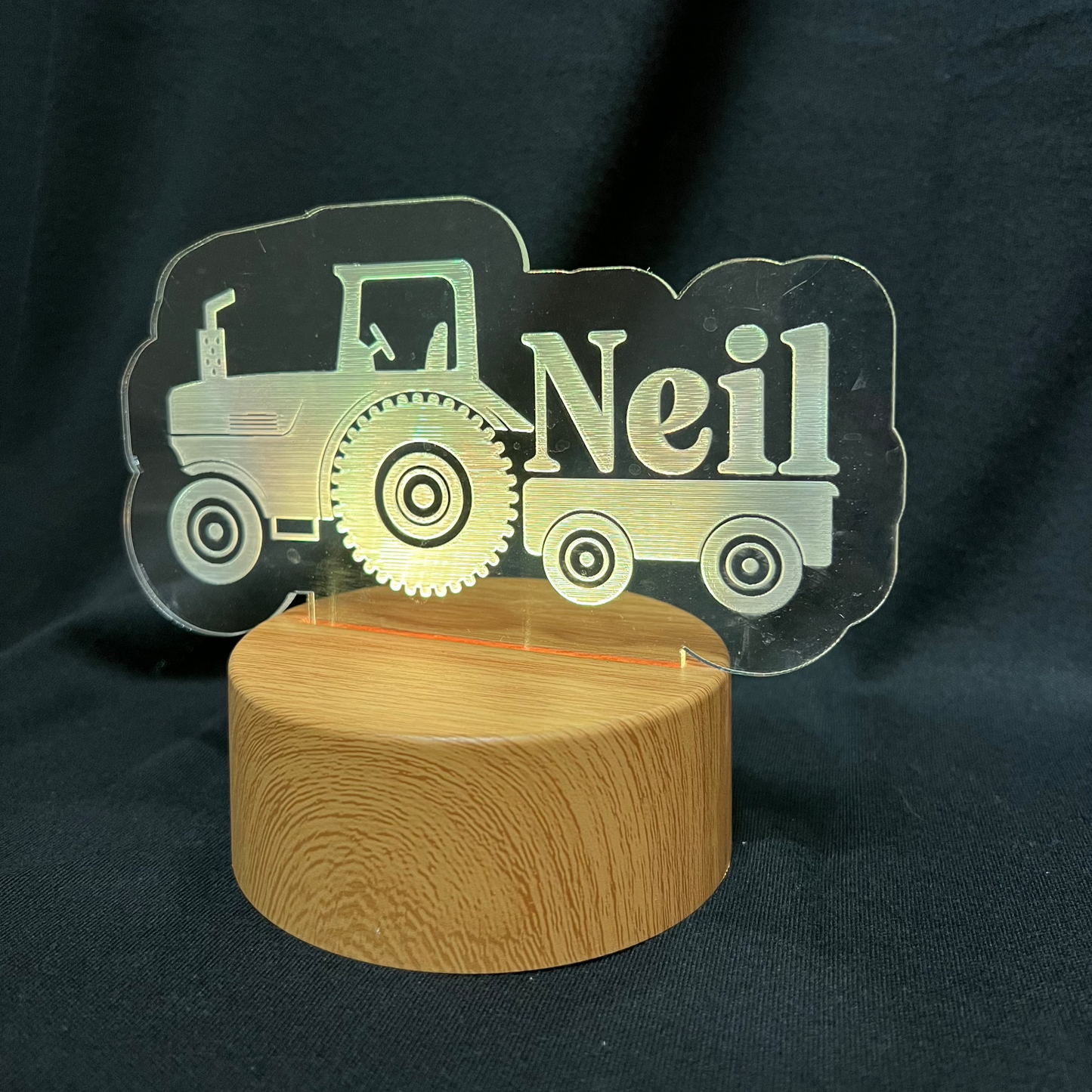 Custom LED night light featuring a tractor design and engraved name