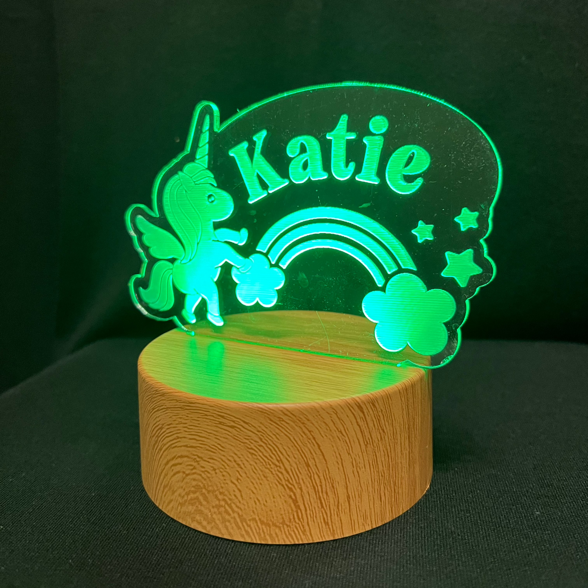 Unicorn Name Night Light – Personalized LED night light featuring an engraved unicorn with a rainbow and stars, glowing softly around a custom name for a magical, dreamy touch