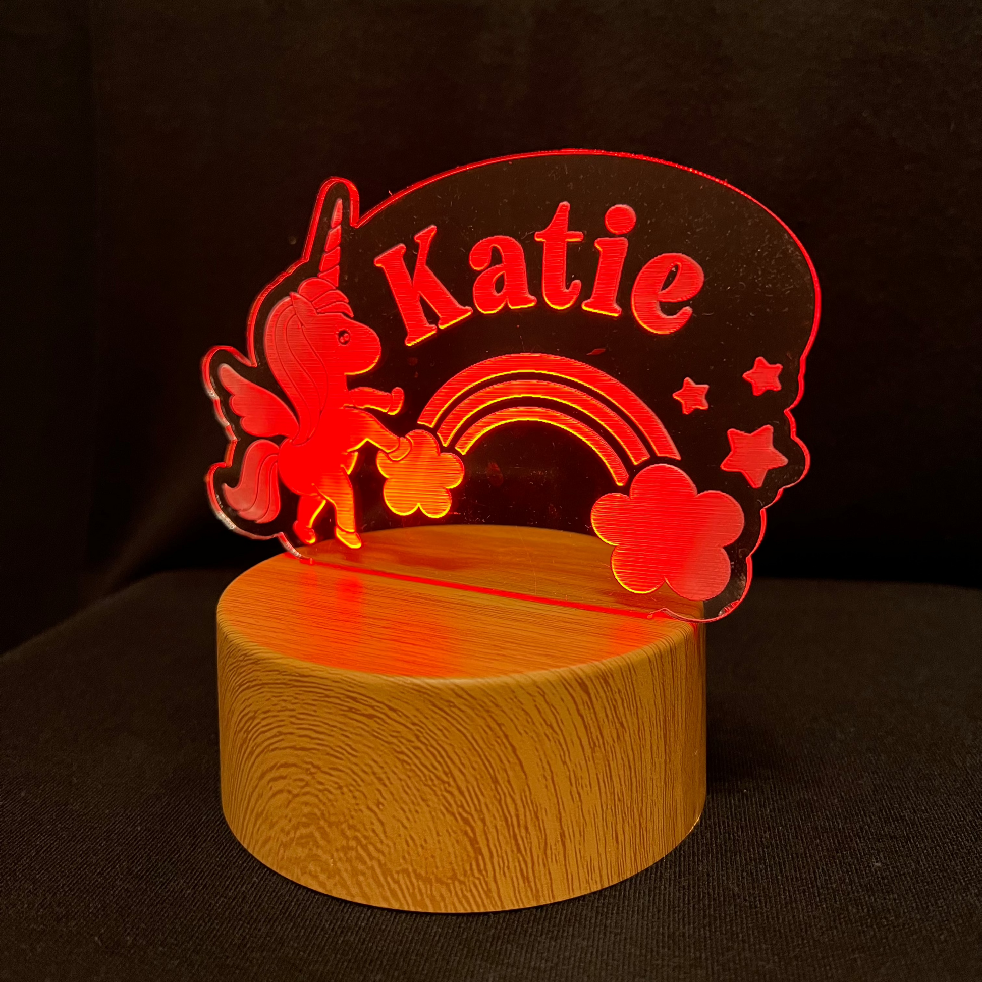 Unicorn Name Night Light – Personalized LED night light featuring an engraved unicorn with a rainbow and stars, glowing softly around a custom name for a magical, dreamy touch